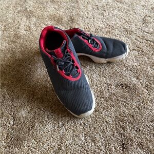 Black, university red and white Air Jordan Future Low sneakers